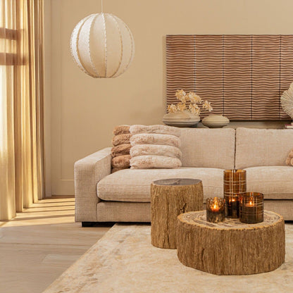 Taly Koffietafel Small van PTMD, salontafel voor een beige hoekbank in een warme woonkamer