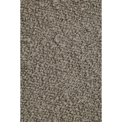 Close-up van de gemeleerde pool van het taupe Noble vloerkleed van MUST Living